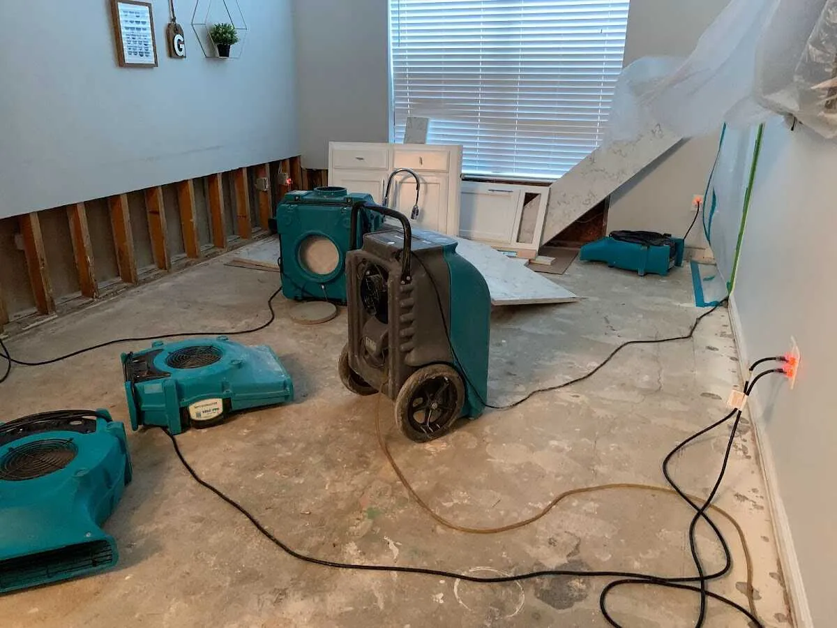 Dehumidifier in flood-cut room for Water Damage Restoration in Waukee